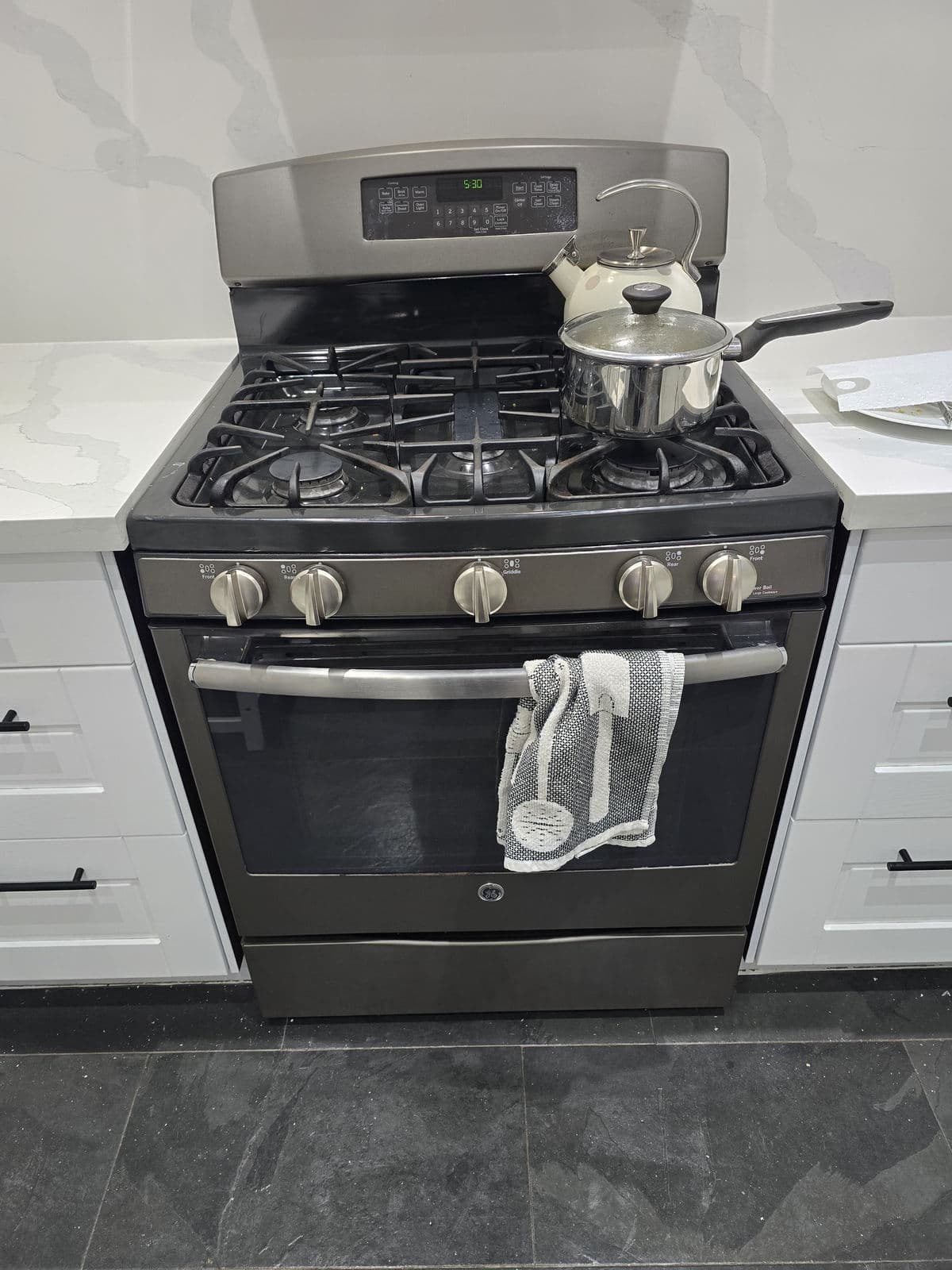 GE gas range repair in a kitchen