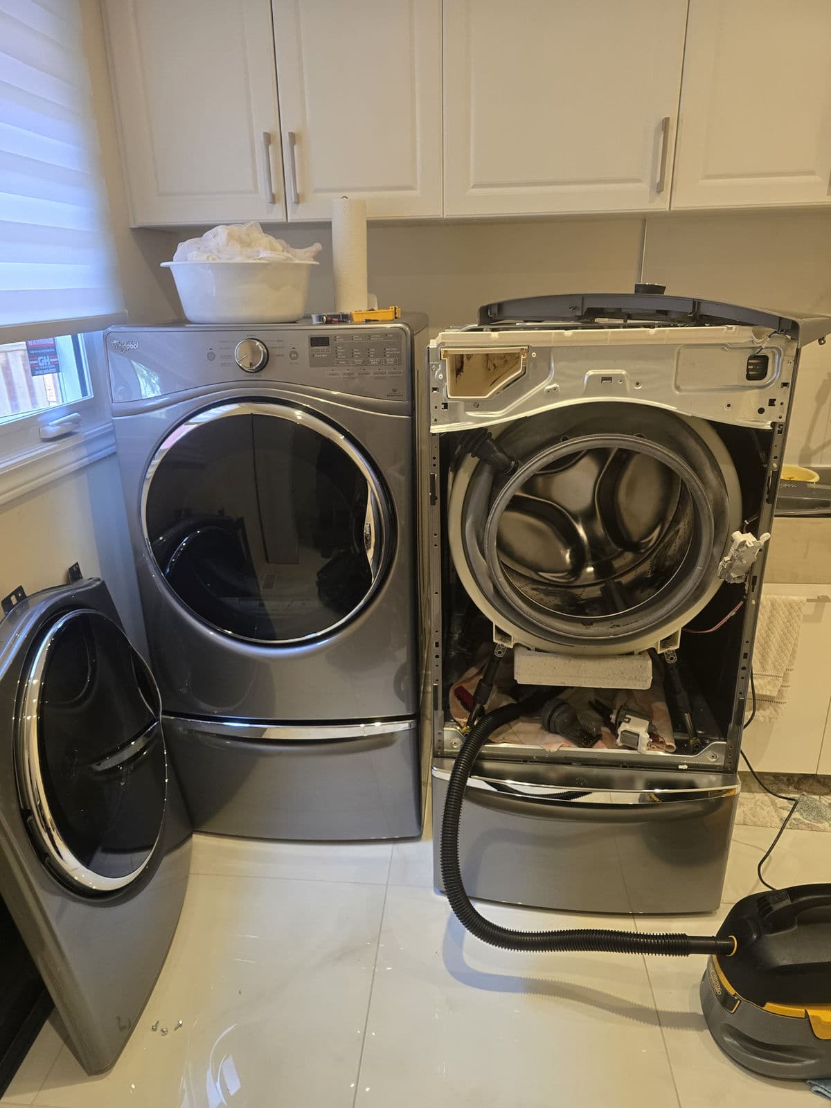 Washer repair in a Maple laundry room